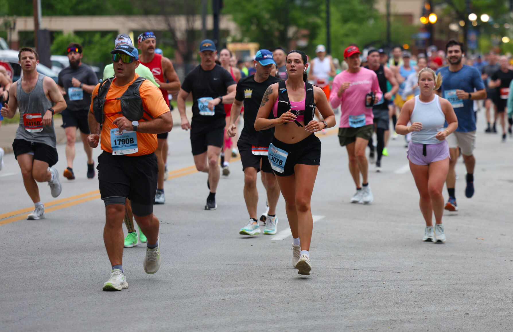 Runners turn off Broadway during Marathon.JPG